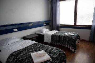 Фото номера Двухместный номер с 2 отдельными кроватями Отель Hotel Susihukka г. Каухава 7